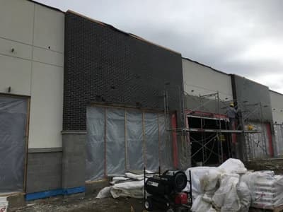 Commercial brick facade construction
