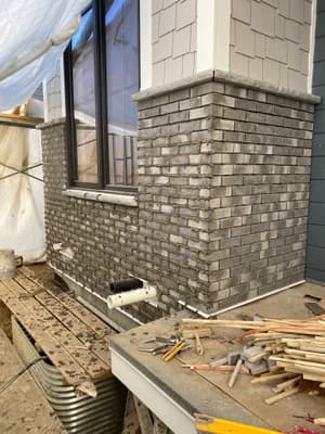 Gray brick detail with decorative cap