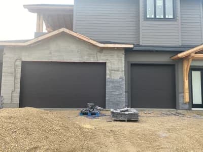 Stone veneer garage and entry installation